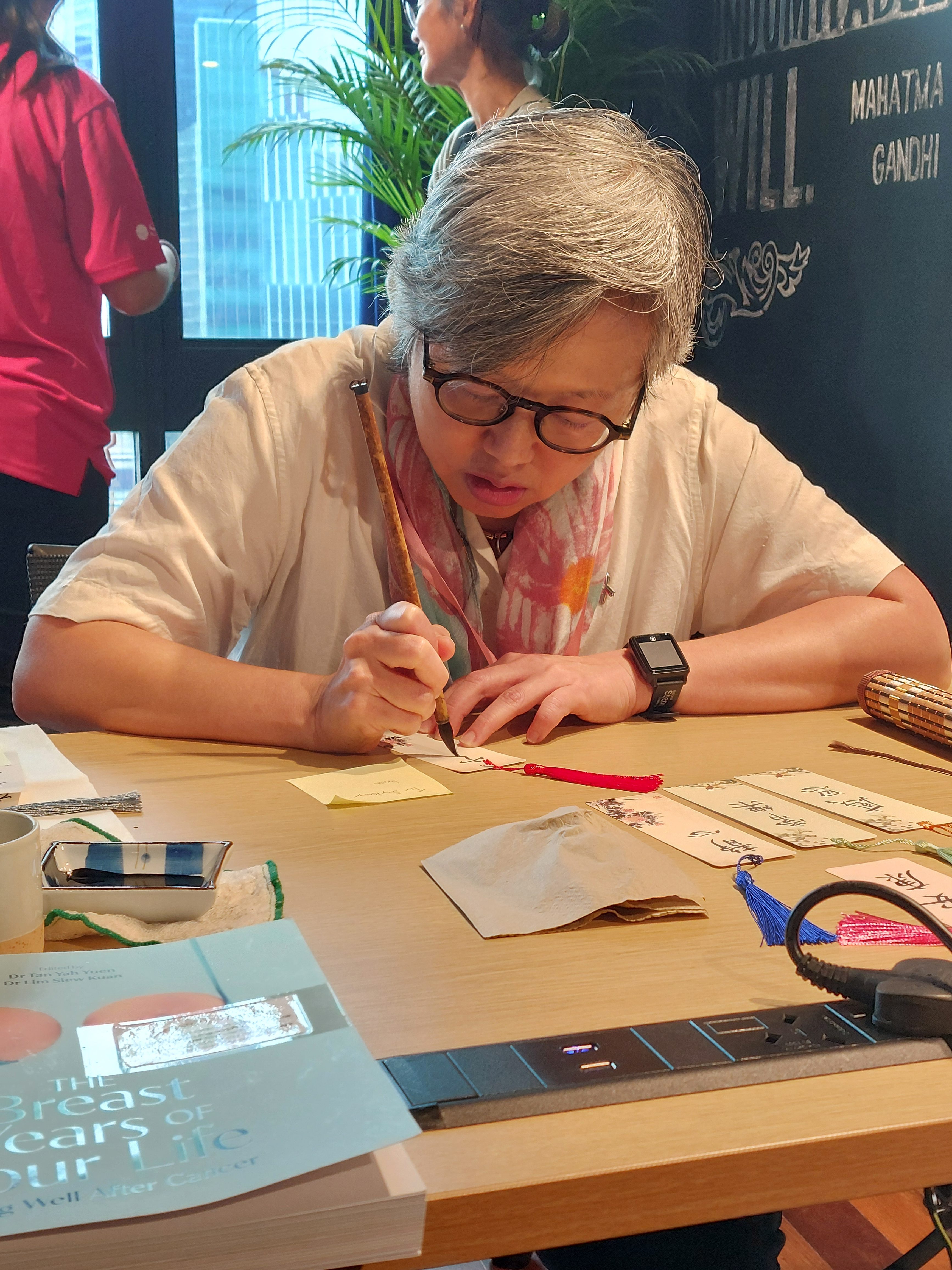 Solis Book Sale & Dr Tan’s customised calligraphy bookmark booth